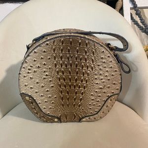 Circular purse with crossbody strap